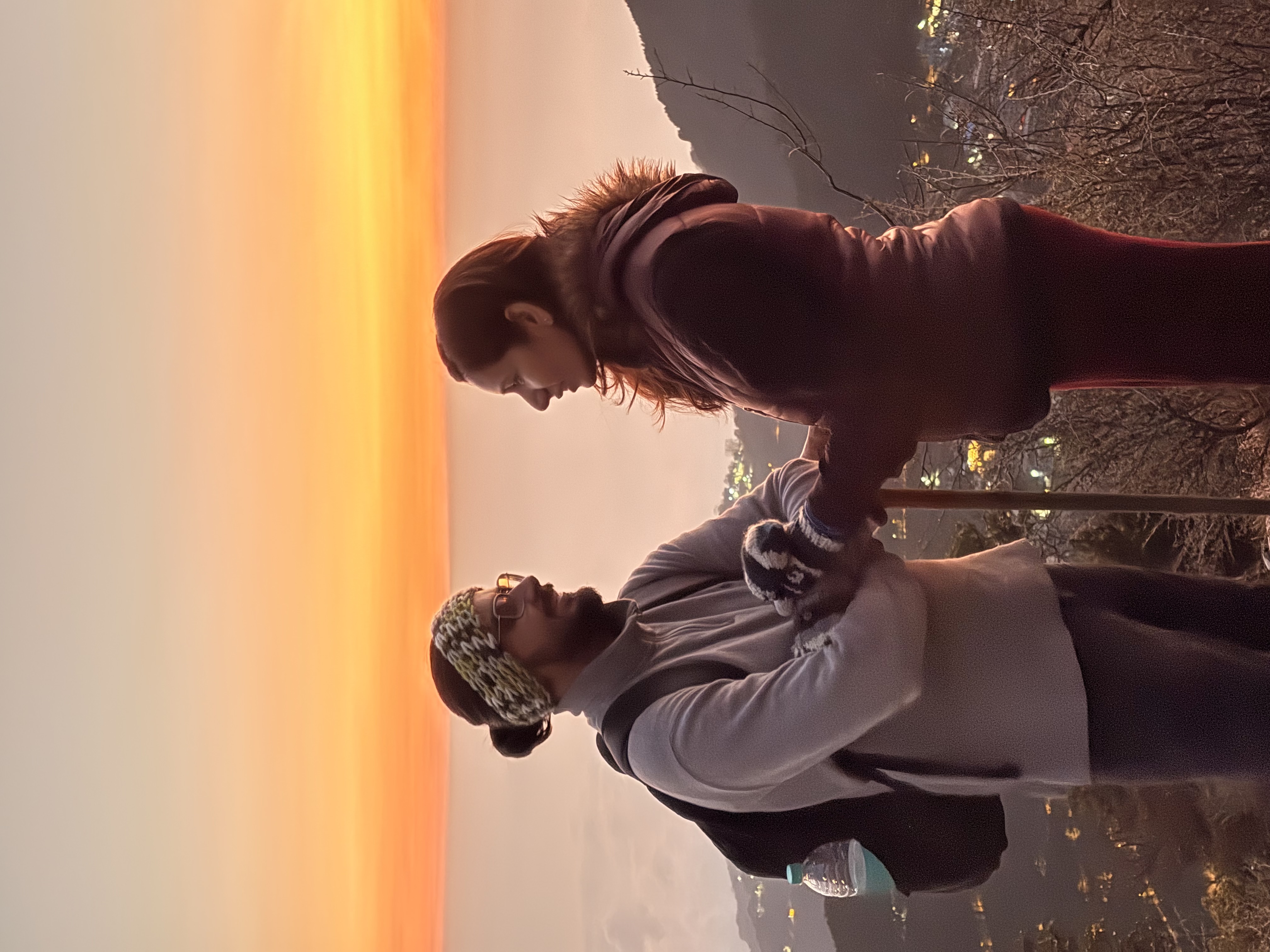 Chetna and Samarth, Co-founders of RoamRani, at sunrise in the Himalayas